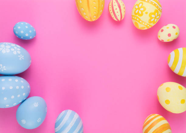 istock Happy Easter day decoration colorful eggs on paper background with copy space. 1303477614