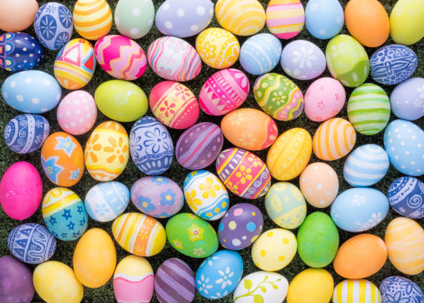 istock Happy Easter day decoration colorful eggs on the grass background 1303477984