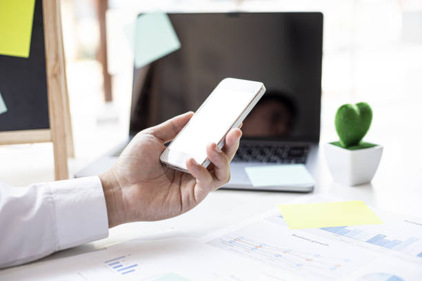 istock Businessmen are using mobile phones 1303479750