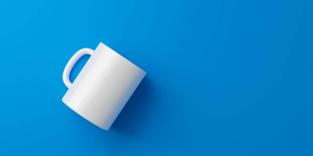 istock Blue coffee cup or empty mug for drink on vivid color background with blank ceramic porcelain mockup template. 3D rendering. 1303481039