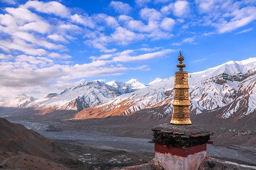 Roof of an ancient Buddhist Key Gompa Monastery on the background of mountain valley at sunset in Spiti valley, Himachal Pradesh, India