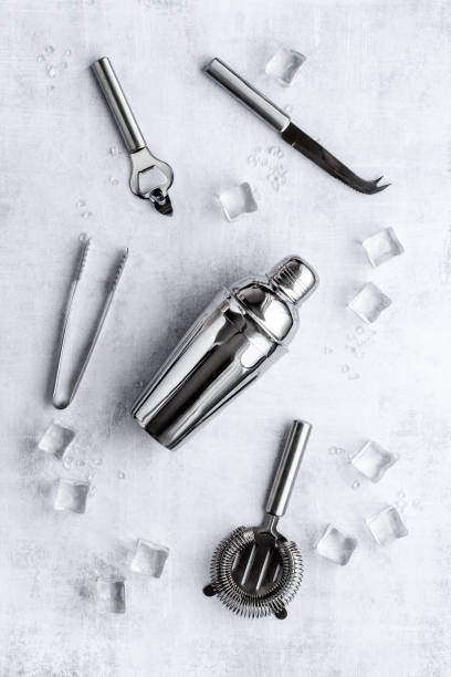 istock Barman equipment tools and cocktail ingredietns, top view 1303483734