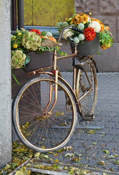 istock Vintage bicycle, decorative elements and flowers. 1303483966