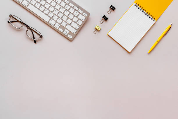 istock Perfectionist workplace. Flat lay desktop with keyboard and office supplies 1303484466