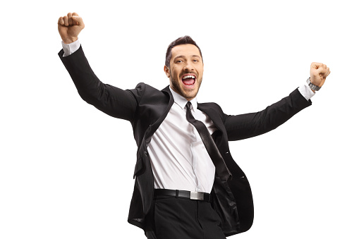 Businessman jumping in excitement isolated on white background