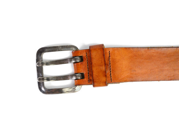 istock fragment of brown leather belt isolated on white background 1303486140