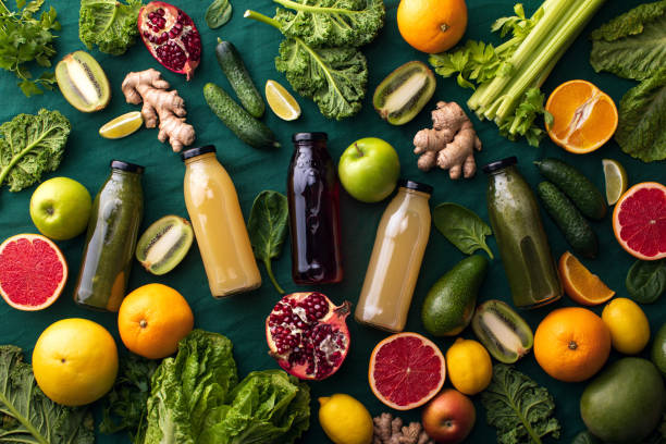 istock Fresh fruit and vegetable smoothies or juice in bottles with various ingredients around 1303488824