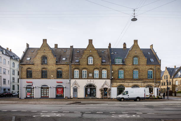 Old houses in the style which in Denmark is called Byggeforeningshuse - build by small societies of workers who financed the buildings and distributed them by a lottery. This one is place close to Svanemøllen Station a suburb close to Copenhagen