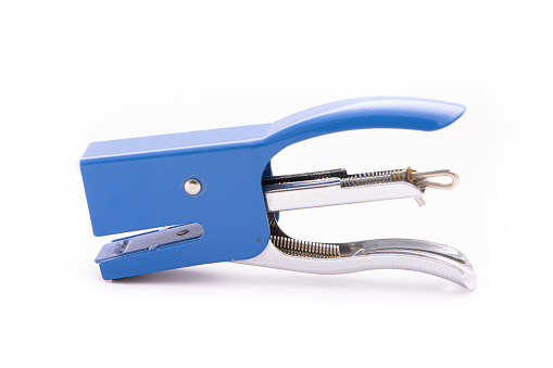 Photograph of adjustable pliers on a blue table