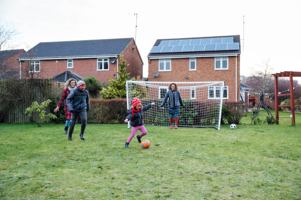 istock Family Playing Sports 1303495732