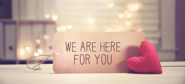 We are Here for You message with a red heart We are Here for You message with a red heart with heart shaped lights encouragement stock pictures, royalty-free photos & images