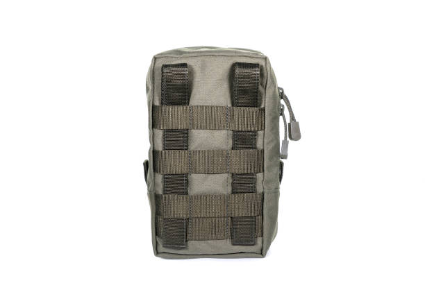 istock Multifunctional Tactical Weekender Convertible Outdoor Travel Canvas Backpack Isolated on White. Modern Camping Traveler Back Pack Bag with Shoulder Straps and Haul Loop. Tactical Hiking Backpack 1303497003