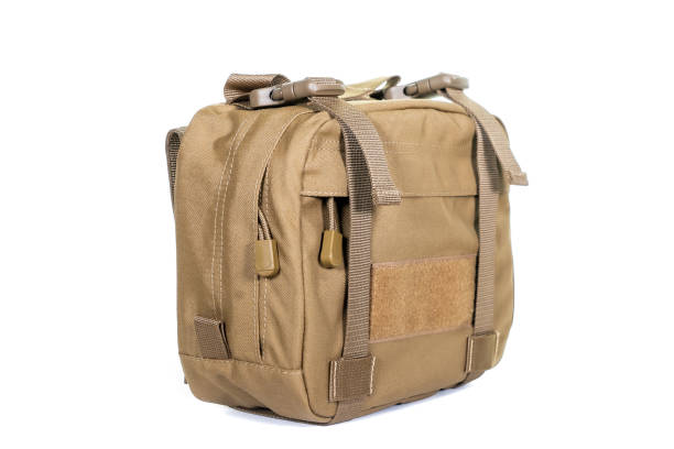 istock Green Canvas Backpack Isolated on White. Front View of Modern Waterproof Camping Traveler Back Pack Bag with Shoulder Straps and Haul Loop. Tactical Hiking Backpack For Travel Travel for Men 1303497467