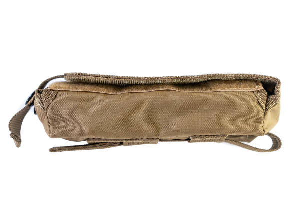 istock A bag containing magazines on a white background. bag for magazine firearms Pouch version with a tubular magazine. Pistol wallet. 1303497669