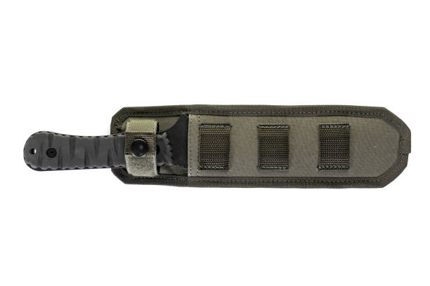 istock Black throwling military knife with case isolated on white background. 1303497793