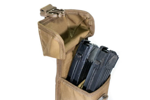 istock A bag containing magazines on a white background. bag for magazine firearms Pouch version with a tubular magazine. Pistol wallet. 1303497815