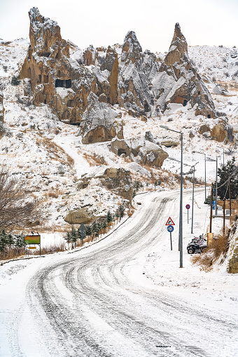 Fairy Chimney in Cappadocia in winter, under snowfall