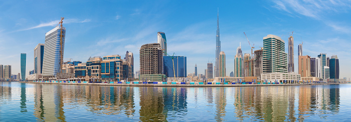 Dubai - The panorama with the new Canal and skyscrapers of Downtown.