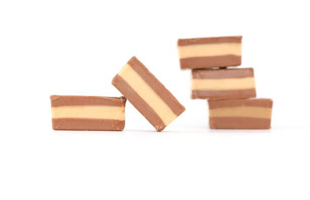 Cremino chocolate filled with hazelnut paste on white background. It's a traditional italian sweet from Piedmont