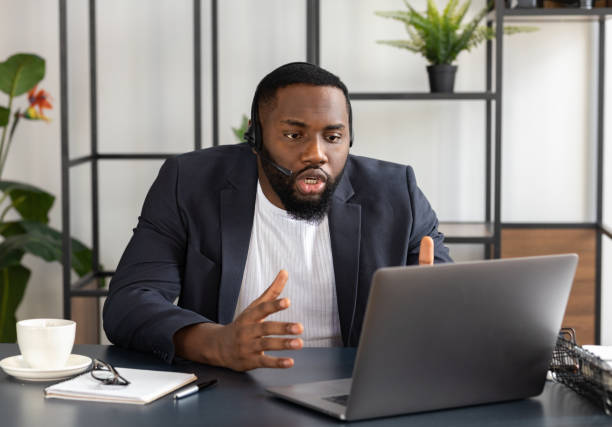 istock Angry boss talking chat with to his coworker using laptop. Video call, self-isolation concept 1303502719