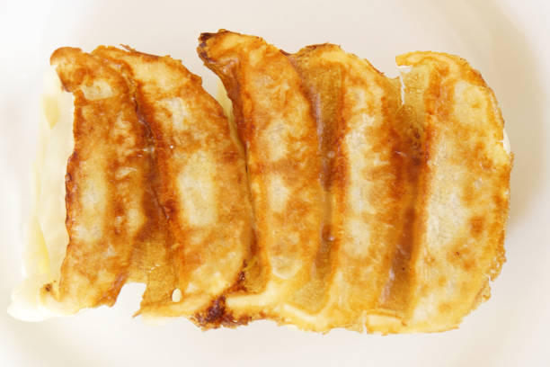 Grilled dumplings that look delicious.