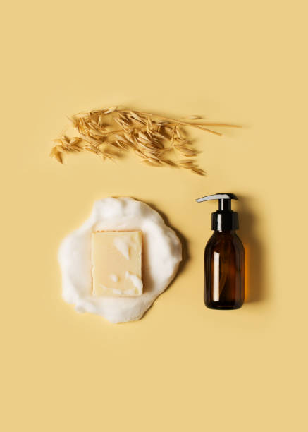 istock Liquid and bar natural eco soap lat lay on yellow background 1303504089