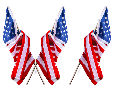 the beautiful star-striped flag of the United States of America hangs on a flagpole in two variations one and crossed