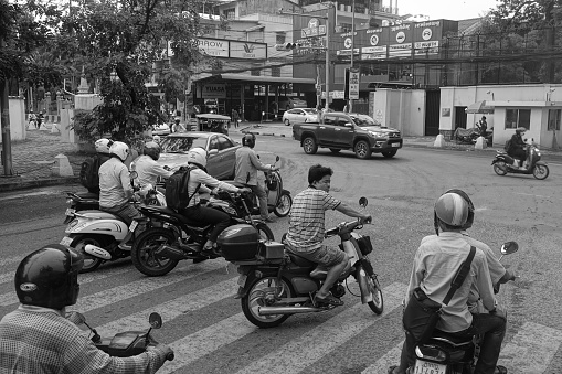 Phnom Pehn, Cambodia-September 3, 2108:Motorbike traffice in a busy Phnom Penh interesection.