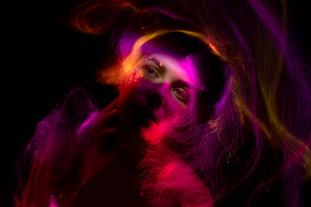 istock light painting portrait 1303507009
