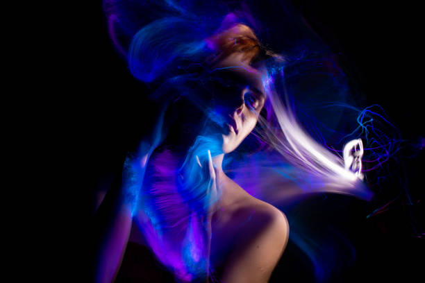 istock light painting portrait 1303507074