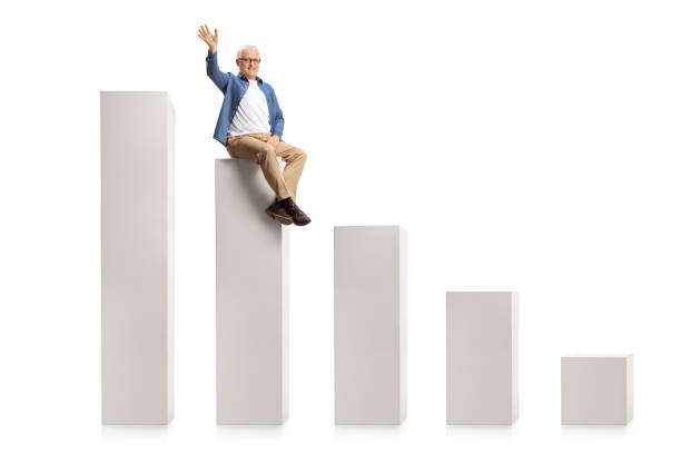 istock Smiling mature man sitting on a graph chart and waving at camera 1303507081