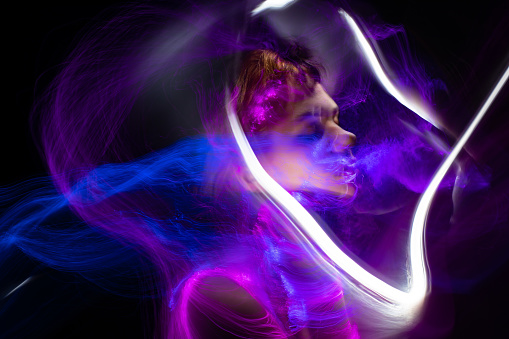 new art direction, long exposure photo without processing, light drawing at long exposure