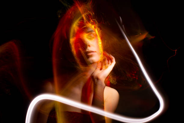 istock light painting portrait 1303507156