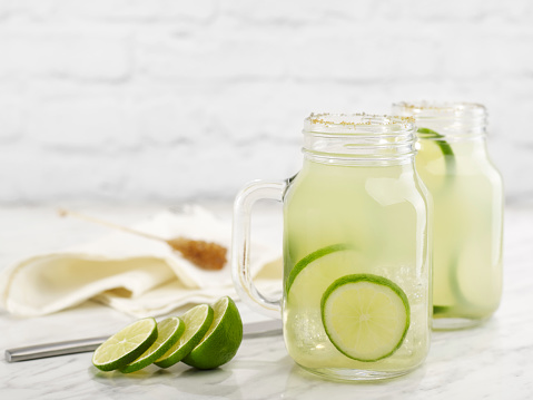 Fresh lime drink in jars