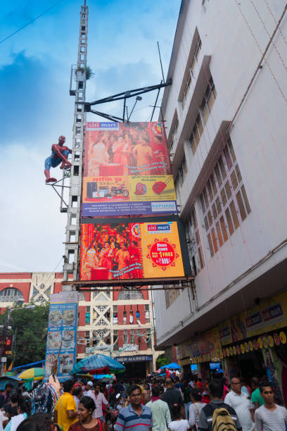 Kolkata, West Bengal, India - 10th September 2019 : Movie goers outside Lighthouse cinema hall, one of the oldest cinema halls at Esplanade, New Market area, Kolkata.