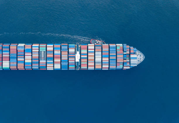 istock Aerial View of Freight Ship with Cargo Containers 1303511558