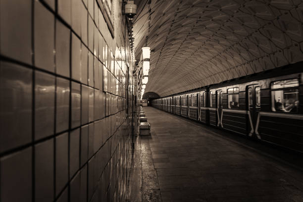 istock An empty platform at a subway station. The train goes into the tunnel. 1303514029