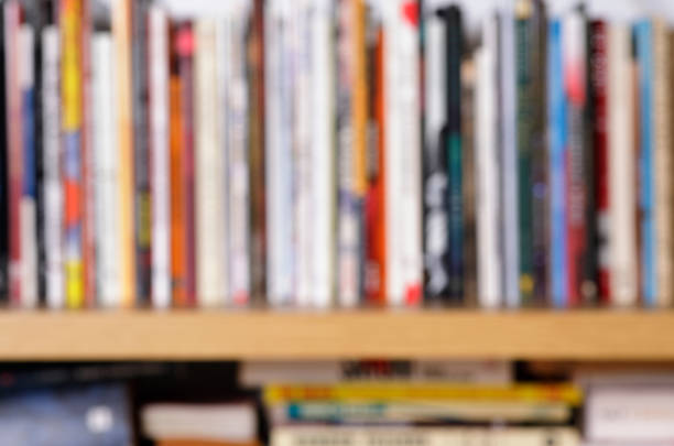 istock Defocused shelves with books colorful background 1303517220