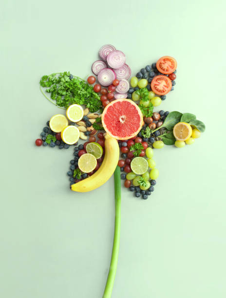 istock Organic fruit and vegetables, spring flower shape concept 1303517383