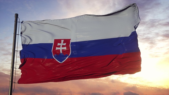 Flag of Slovakia waving in the wind against deep beautiful sky. 3d illustration.