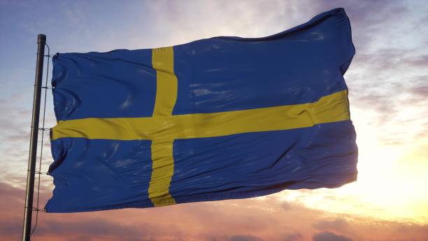 bandiera svedese che sventola nel vento contro un cielo profondo e bello. illustrazione 3d - day sky swedish flag banner foto e immagini stock