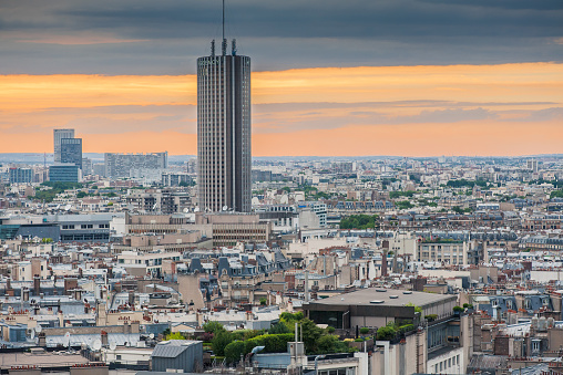 View of the Champs-Elysees with the Montparnasse Tower in the background, seen from the Arc de Triomphe in the afternoon
