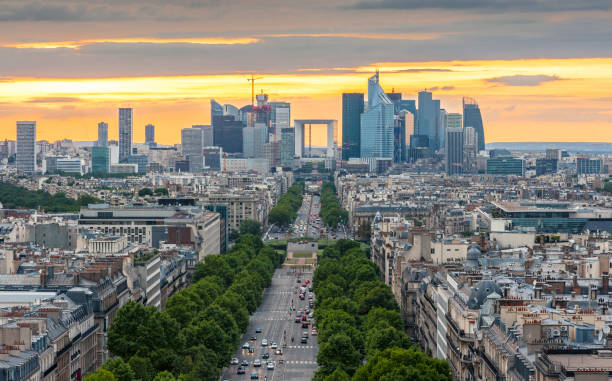 istock Champs Elysees in the evening and La Defence district 1303519256