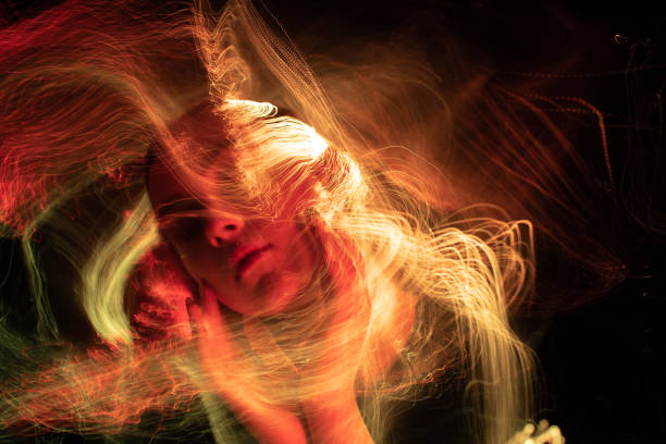 istock light painting portrait 1303521171