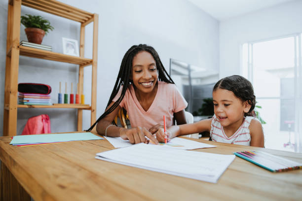 istock Homeschooling - child studying at desk 1303521484