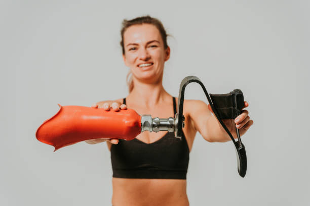 istock Beautiful woman with prosthesis leg 1303526723