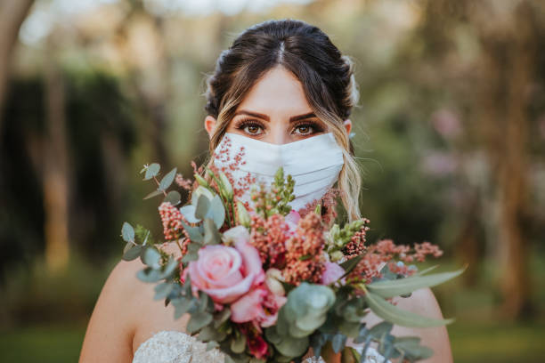 Bride wearing face mask against coronavirus