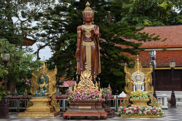 istock Wooden Standing Buddha at Wat Phra That Doi Suthep 1303530427