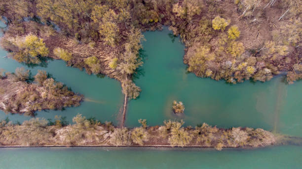 istock Flooded river banks - aerial view 1303539844