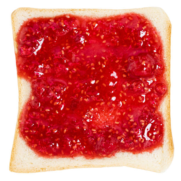 istock toast with jam isolated on white background 1303546800